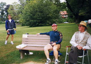 CHS XC Adam on the bench next to Mr. Trautwein