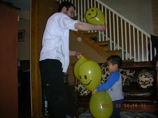 Gaby's fourth birthday - Eric, Gaby -- balloons