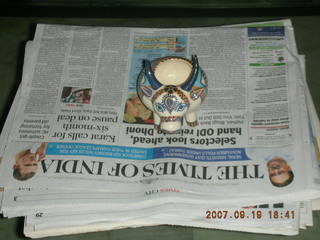 48 69g. center room in suite, Essel Towers, Gurgaon, India - newspaper