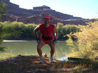 173 6bg. Canyonlands National Park - Lathrop Trail hike - Adam (tripod) - Colorado River