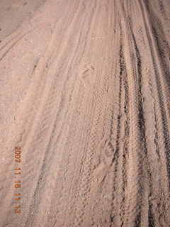 195 6bg. Canyonlands National Park - Lathrop Trail hike - barefoot human footprints
