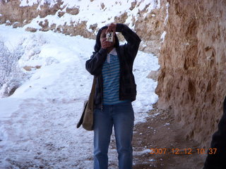 Grand Canyon with snow and clouds - Aditi taking picture