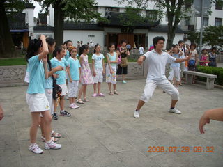 55 6kv. eclipse - Shanghai - Zhu Jia Jiao village - girls joining us for Tai Chi