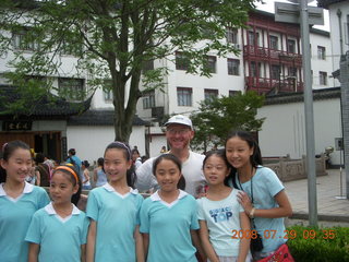 59 6kv. eclipse - Shanghai - Zhu Jia Jiao village - girls joining us for Tai Chi and Adam