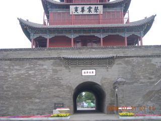 69 6kx. eclipse - Jiuquan - morning run - center of town monument