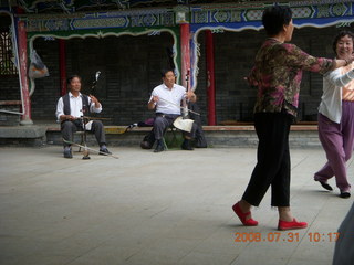 163 6kx. eclipse - Jiuquan park musicians