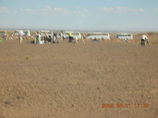 185 6l1. eclipse - Jiayuguan - Gobi Desert - buses and people