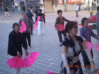 67 6l1. eclipse - Jiuquan morning run - Tai Chi people