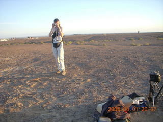 317 6l1. eclipse - Jiayuguan - Gobi Desert - afterward - Ann Marie taking our picture