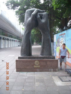 29 6l5. eclipse - Hong Kong morning run - hands sculpture