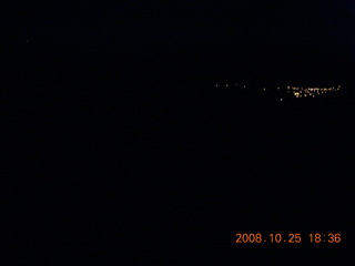 Bryce Canyon - sunset view at Bryce Point - town of Tropic in low light