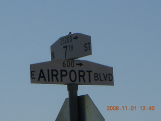 16 6p1. Airport Road sign