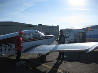 13 6qg. beth's Saturday zion-trip pictures - Adam with N4372J and fueling fellow