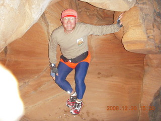 89 6ql. Zion National Park - Angels Landing hike- Adam in rock in Refrigerator Canyon
