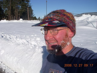 Adam running in the cold snow at Flagstaff Airport (FLG)
