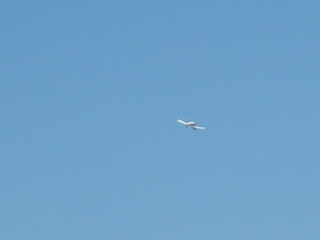10 6un. Charles Lawrence photo - Charles and Adam flying N4372J at Fry Canyon - in-flight photo