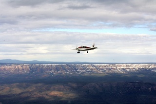 Adam flying N4372J