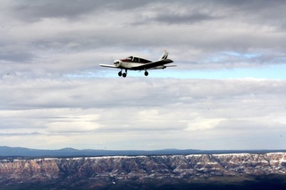 Adam flying N4372J