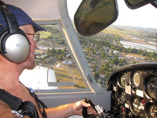 Adam flying N8377W