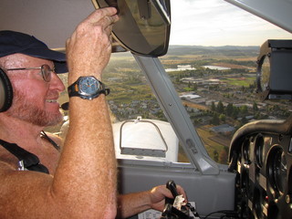 Adam flying N8377W