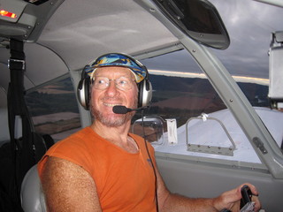 Adam flying N8377W