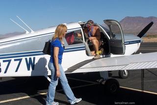 Safford fly-in and half marathon - Ken's photo - Bonnie abnd Adam getting into N8377W