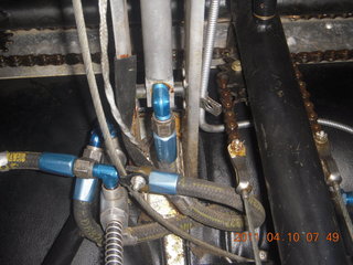 21 7ja. N8377W under instrument panel - cylinder temp gauge and controls chain tangle