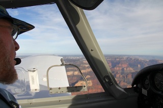 Adam flying N8377W
