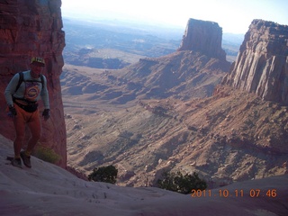 41 7qb. Canyonlands National Park - Lathrop trail hike - Adam hiking (tripod)