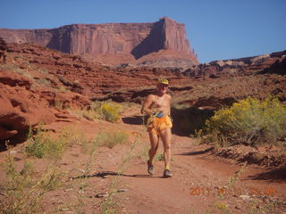 85 7qb. Canyonlands National Park - Lathrop trail hike - Adam running (tripod)
