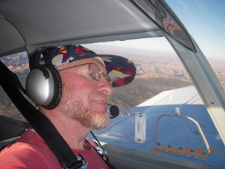Adam flying N8377W