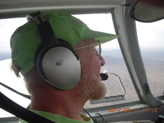 Adam flying N8377W