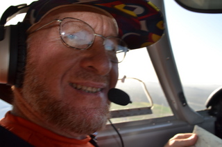 Adam flying N8377W