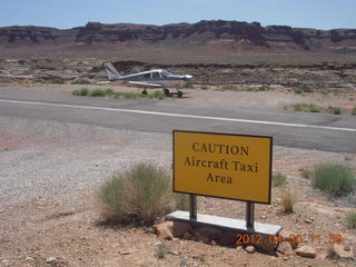 69 7ww. Hite run - N8377W and airport sign