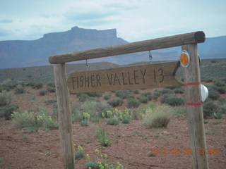 177 7x2. driving on Route 128 to Onion Creek - turnoff sign