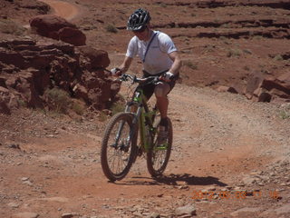 177 7x3. Harrah Pass drive back - mountain biker at the pass