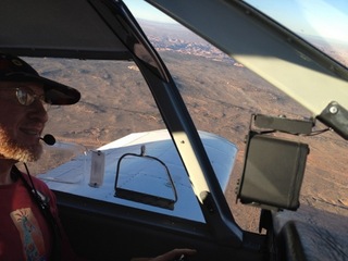 Adam flying N8377W