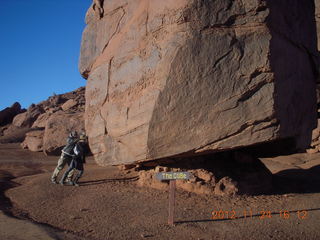 435 83q. Monument Valley tour - Sean and Kristina holding up cube rock