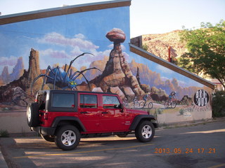 116 89q. my red Jeep at Poison Spider bike shop