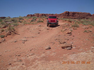 119 89t. Chicken Corner drive - my red Jeep driving down a hill