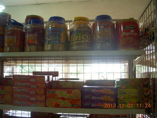 66 8f1. Uganda - drive north to Chobe Sarari Lodge - local store selection