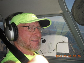 Adam flying N8377W