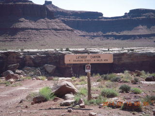 114 8mf. White Rim Road drive - Lathrop Canyon Road sign