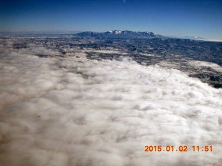 32 8v2. aerial - snow and clouds and canyon