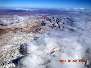 34 8v2. aerial - snow and clouds and canyon