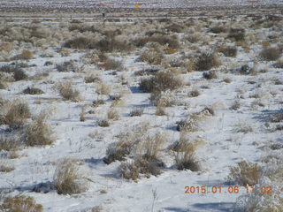 158 8v6. Hanksville Airport (HVE) run - snow covered plants