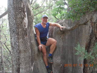 Debbie's and Ted's cabin - hike - Adam in tree