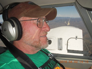 Adam flying N8377W