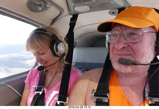 Adam flying N8377W