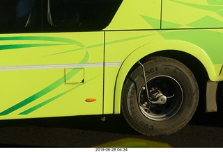 20 a0e. gizmo on back wheel of bus